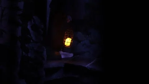 Person Walking Through Dark Corridor Carrying A Glowing Vintage Lantern At Night Stock Footage 342248085