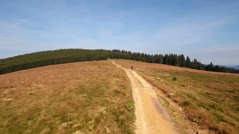 A Person Walking Through A Mountain Path 動画素材 95732289