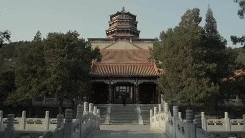 Person Walking Toward Ancient Pavilion at Summer Palace in Beijing China Stock Footage 341781880