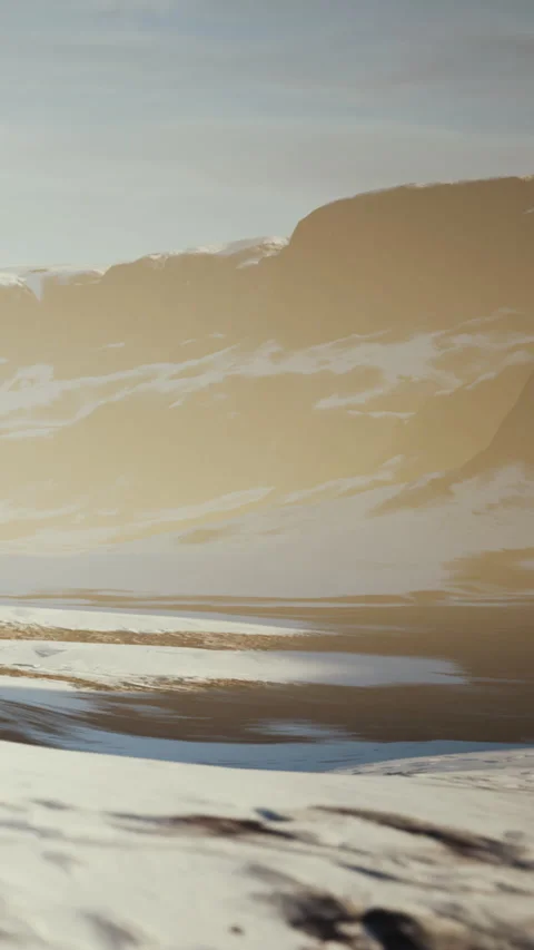 A person walks along a beach at sunset Stock Footage 346758640