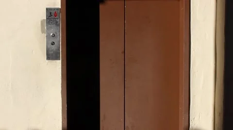 A person walks out of the elevator Stock Footage 58365151