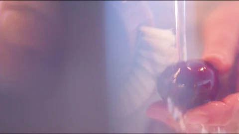 Person washing beetroot under running water Video stock 76139957