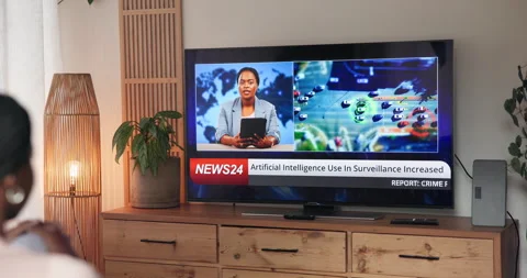 Person, watching tv and screen for news report with back for AI, surveillance or Stock Footage 314360680