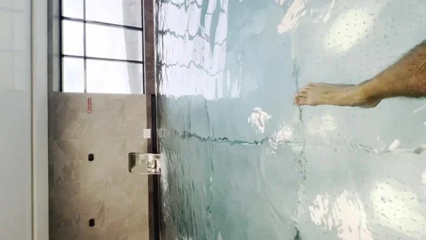 A person is in the water in a pool Stock Footage 282298475