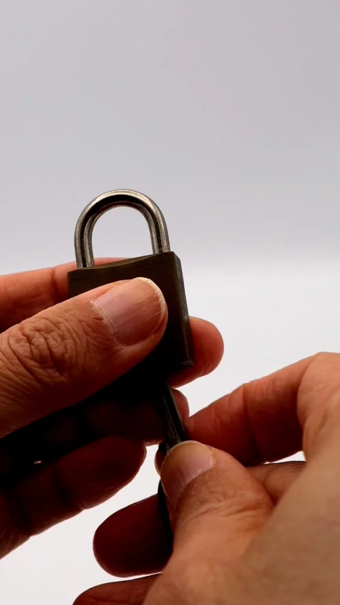 The person who unlocks the padlock Stock Footage 335259169