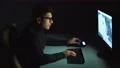 The person working with a 3d manipulator in a computer. night time 4k or 4k+ Resolution