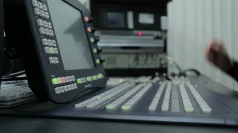 Person working on a Broadcast Switcher Stock-Footage 10610199