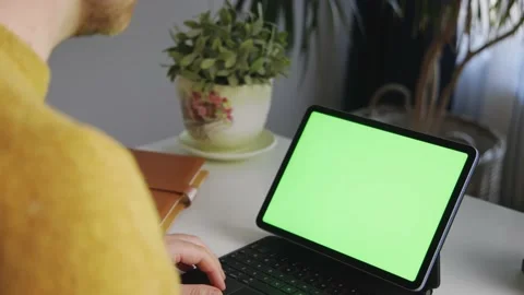 Person Working Desk Remotely Freelancer Greenscreen Laptop Tablet Video stock 195289697