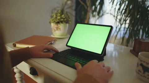Person Working Desk Remotely Freelancer Greenscreen Laptop Tablet Video stock 195289730