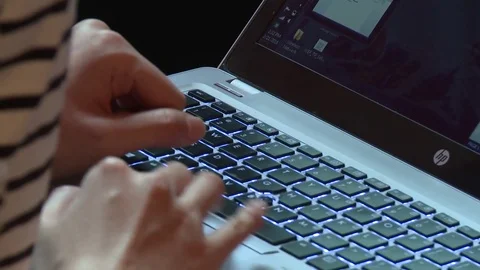 Person working on laptop Stock Footage 73896510