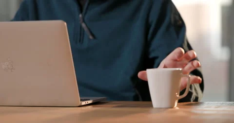 A person working on a laptop Stock Footage 303707488