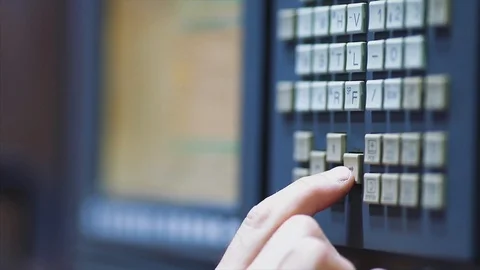 Person works behind the control panel of the production 스톡 동영상 105505666