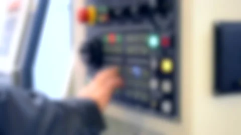 Person works behind the control panel of the production machine Stock Footage 132295952