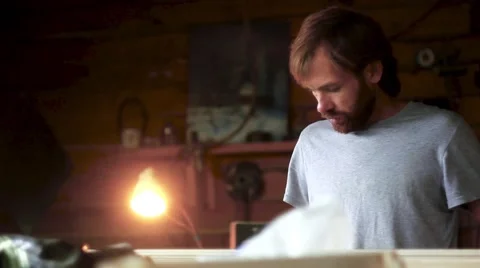 Person in the workshop thinks Stock Footage 66445936