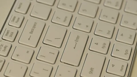 Person wrinting text on the white keyboard. Stock-Footage 104818032
