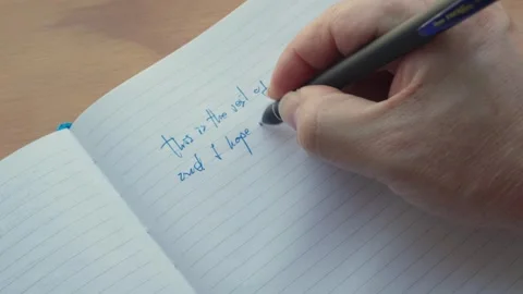 Person writing Stock Footage 304083761