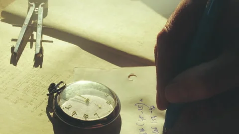 Person Writing Math Formulas with Measuring Divider and Watch 4K Stock Footage 332449961