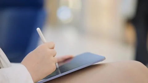 Person is writing on a tablet with a pen Stock Footage 314325863