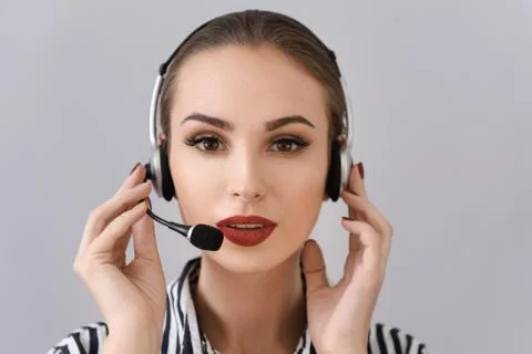 Personal assistant speaking into microphone Stock Photos