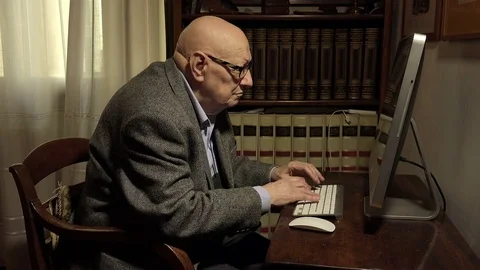Personal computer doesn't work: old worried man don't know what to do Stock Footage