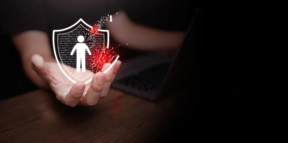 Personal data breach and cybersecurity concept. Broken shield protecting hu.. Stock-Fotos