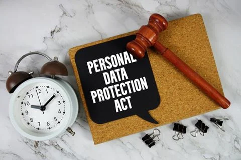 Personal Data Protection Act text on speech bubble with alarm clock and woo.. Stock Photos