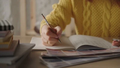 Personal diary, glider. Concept of goal setting, strategy. Close up. Stock Footage 122497083