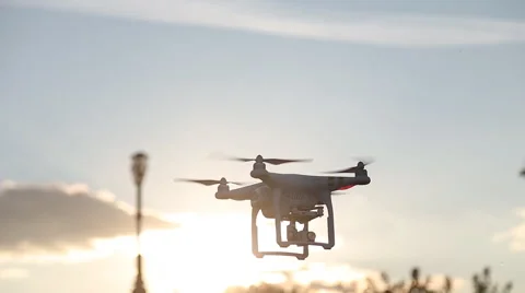 A personal drone flying through the air Stock Footage 54637375