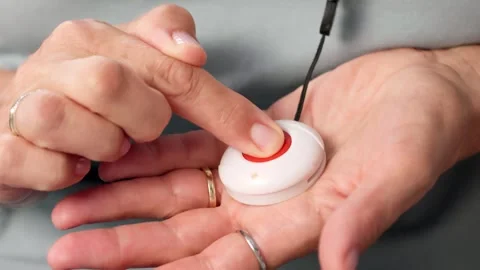 Personal Emergency Alarm Button For Elderly Woman Stock Footage 314138416