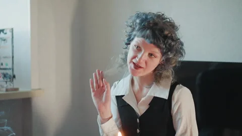 Personal exchange between healer and seeker animatedly expressed. An intimate Stock Footage 346559199