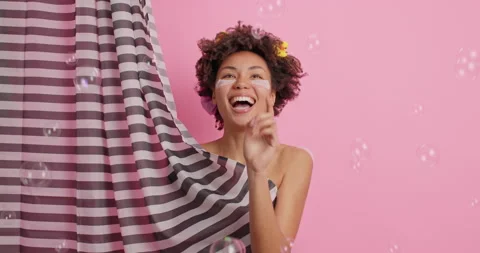 Personal hygiene regular showering concept. Positive carefree young Afro Stock Footage 147991545