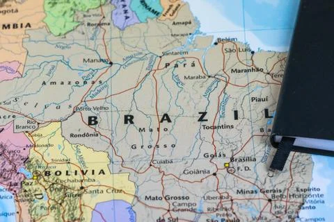 Personal lanning notes of a traveller planning a trip to Brazil over a closeup Stock Photos