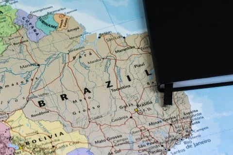 Personal lanning notes of a traveller planning a trip to Brazil over a closeup Stock Photos