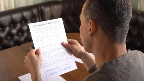 Personal loans application form on a paper Stock Footage 104297472