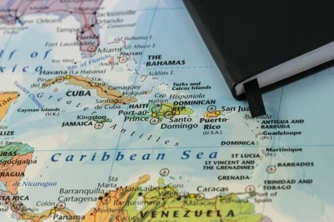Personal notes of someone planning a trip to the caribbean sea over a closeup Stock Photos