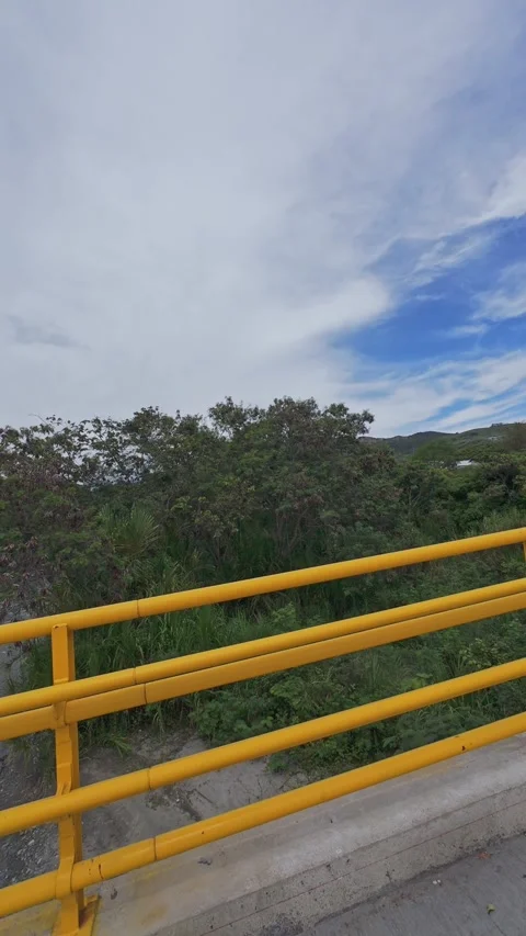 Personal perspective of crossing pedestrian bridge and concrete walkway str.. 動画素材 338203915