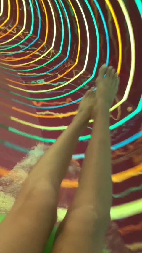 Personal perspective of a girl speeding down at water slide. Aquapark Stock Footage 206858419