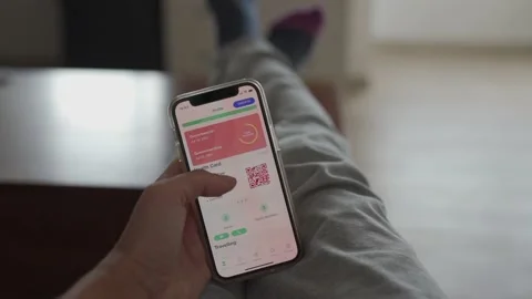 Personal perspective hand holding mobile phone with positive Covid test detec Stock-Footage 157237631