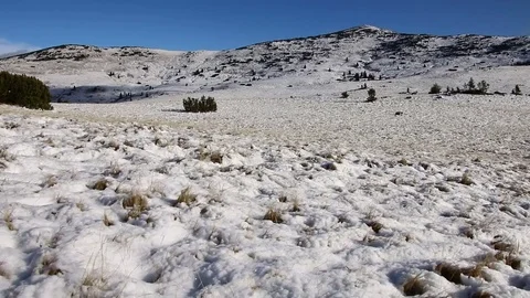 Personal perspective Hiking in the snow mountains Hikers walking Snow winter Stock Footage 82536634