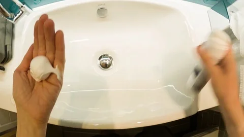 Personal perspective of a man putting shaving foam onto his face Video stock 79166139