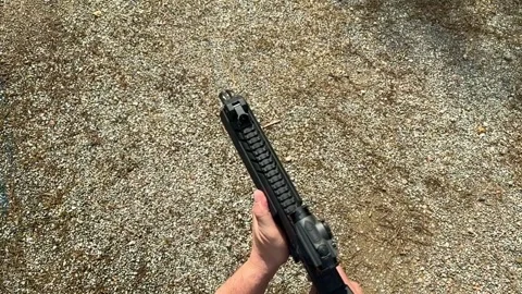 Personal Perspective on a Man Shooting His Assault Rifle Stock-Footage 264756192