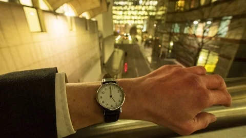 Personal perspective time-lapse of a caucasian businessman checking the time  Video stock 84430756