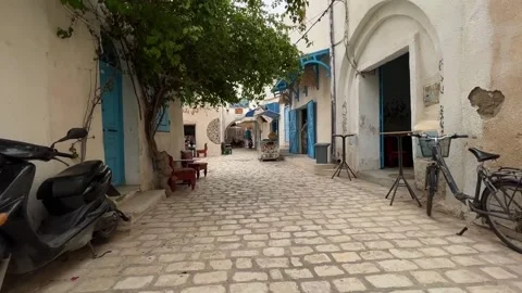 Personal perspective walking in houmt el souk market streets Stock Footage 280793053