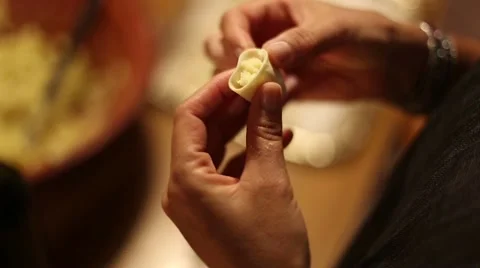 Personal perspective of woman's hands preparing ravioli. Stock Footage 61058279