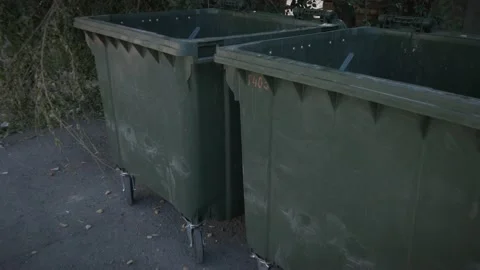 Personal point of view of someone hwo is getting closer to trash container and Video stock 201022072