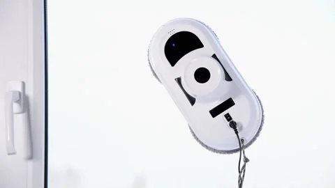 Personal robot washing window Stock Footage 148996385
