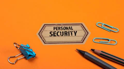 PERSONAL SECURITY. Orange notes and documents folder. Office supplies Stock Photos