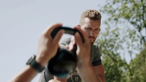 Personal trainer encouraging client during training session 4K. Stock Footage 234544696
