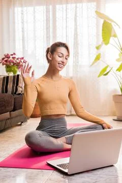 Personal trainer entering with laptop computer in a virtual classroom video Stock Photos