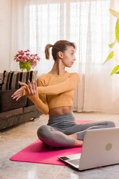 Personal trainer entering with laptop computer in a virtual classroom video Stock Photos